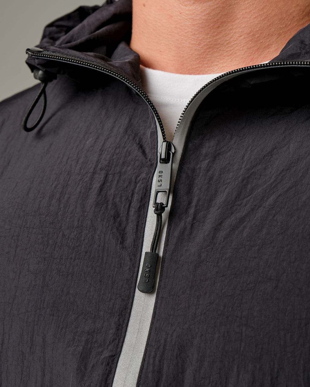 Model wearing Run Club Track Jacket - Black-Reflective