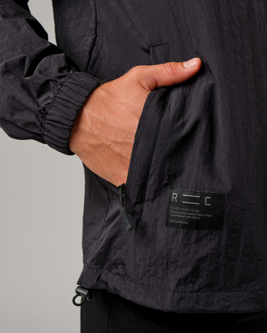 Model wearing Run Club Track Jacket - Black-Reflective
