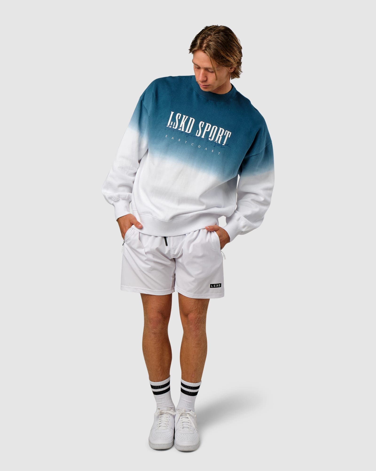 Model wearing Gradient Sweater - Atlantic-White