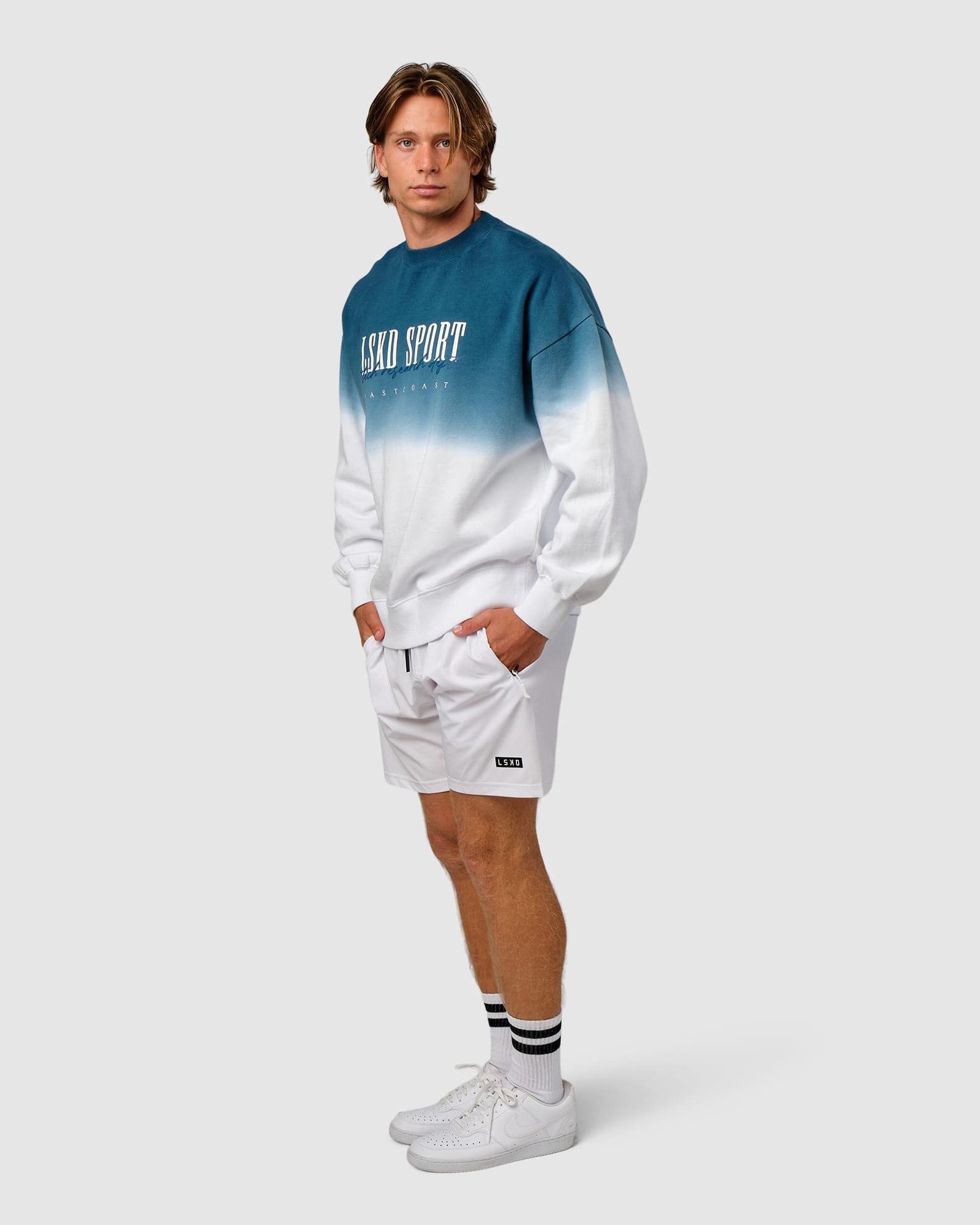 Model wearing Gradient Sweater - Atlantic-White