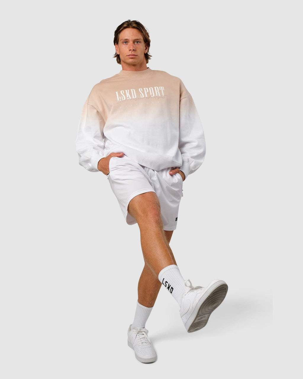 Model wearing Gradient Sweater - Nude-White