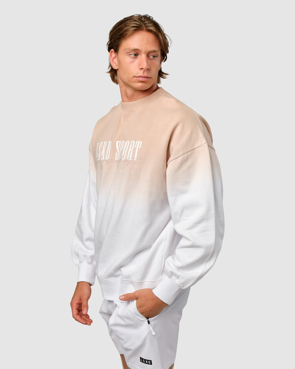 Model wearing Gradient Sweater - Nude-White