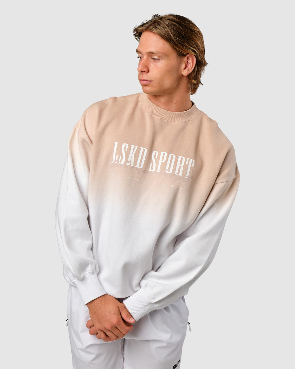 Model wearing Gradient Sweater - Nude-White