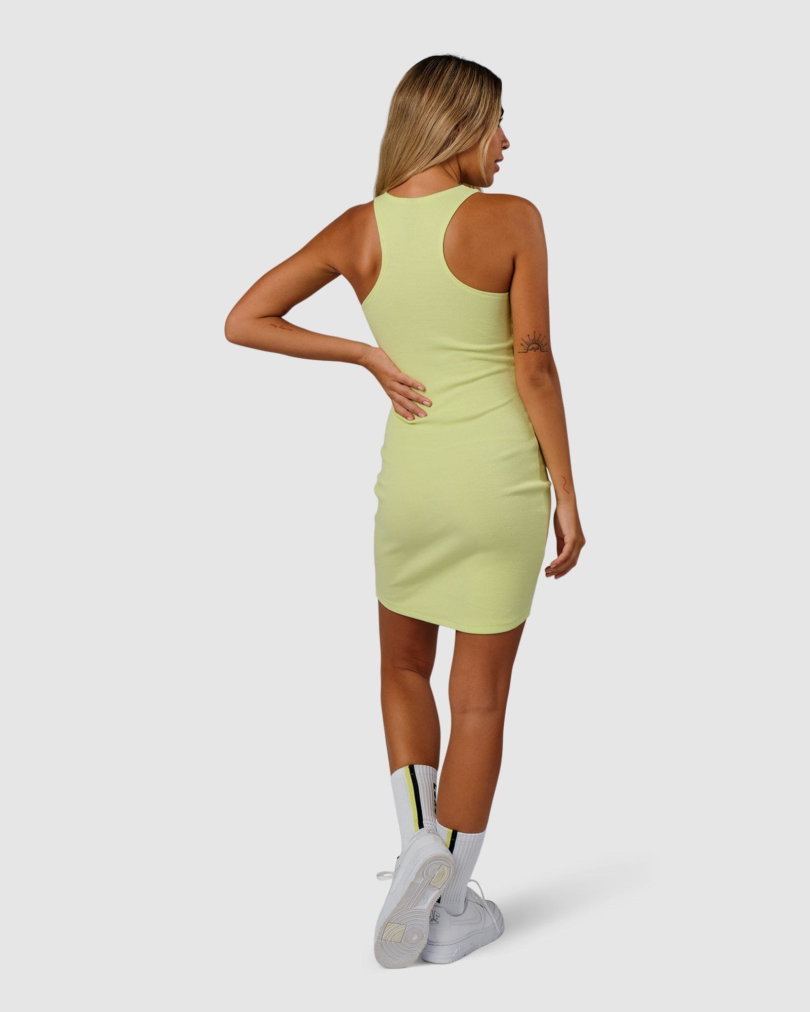 Model wearing Cece Ribbed Tank Dress - Pastel Lime