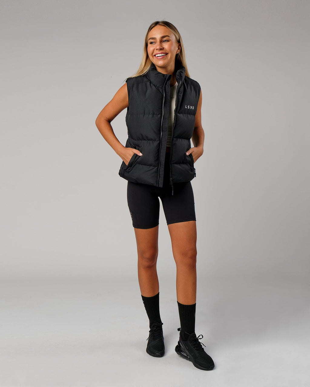 Model wearing Essential Puffer Vest - Black