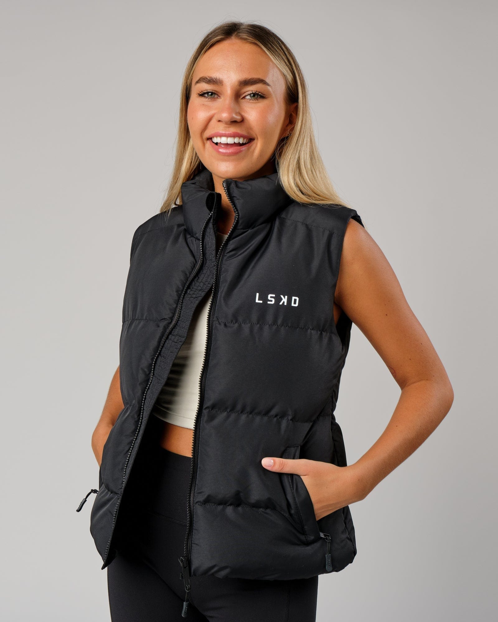 Model wearing Essential Puffer Vest - Black
