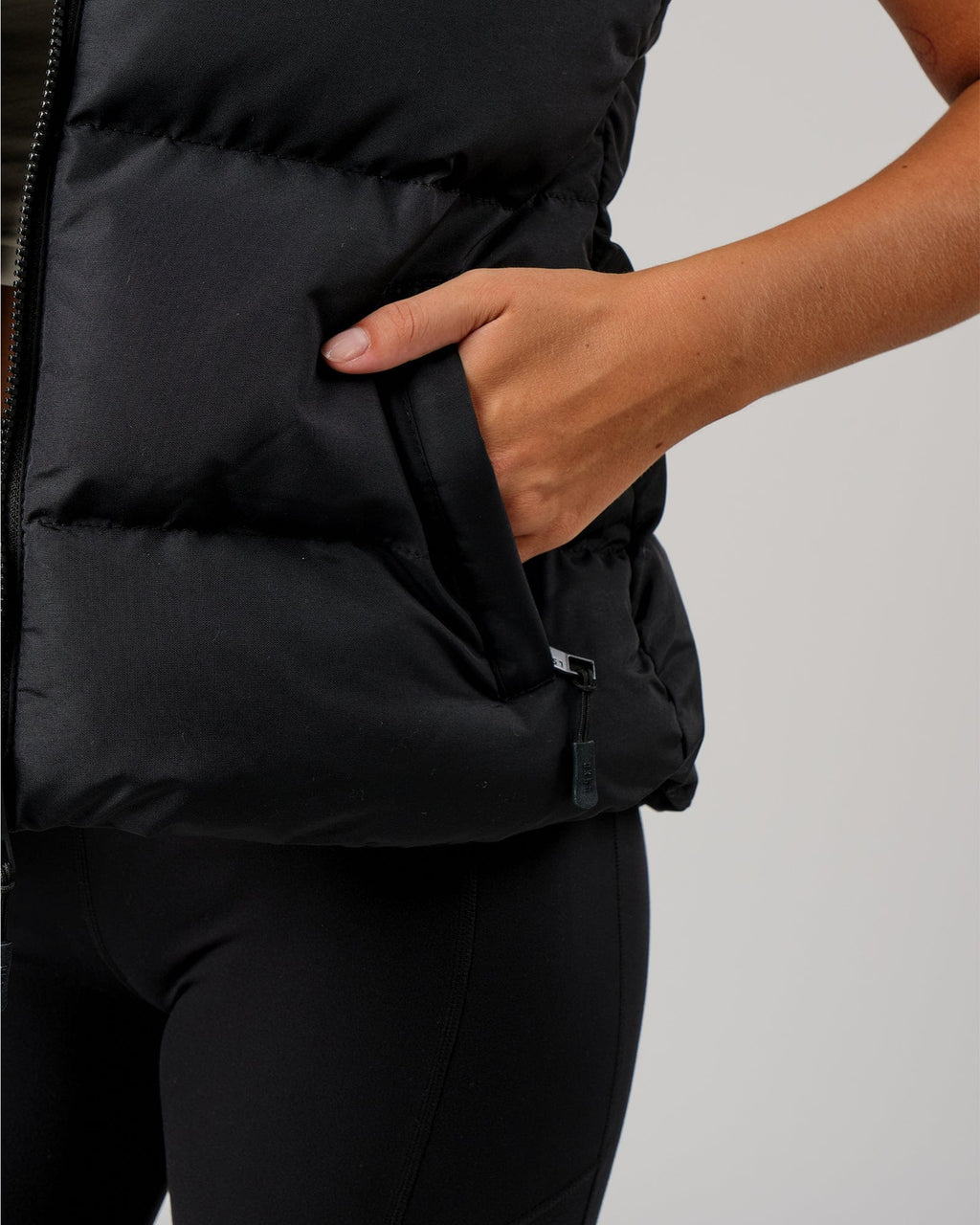 Model wearing Essential Puffer Vest - Black