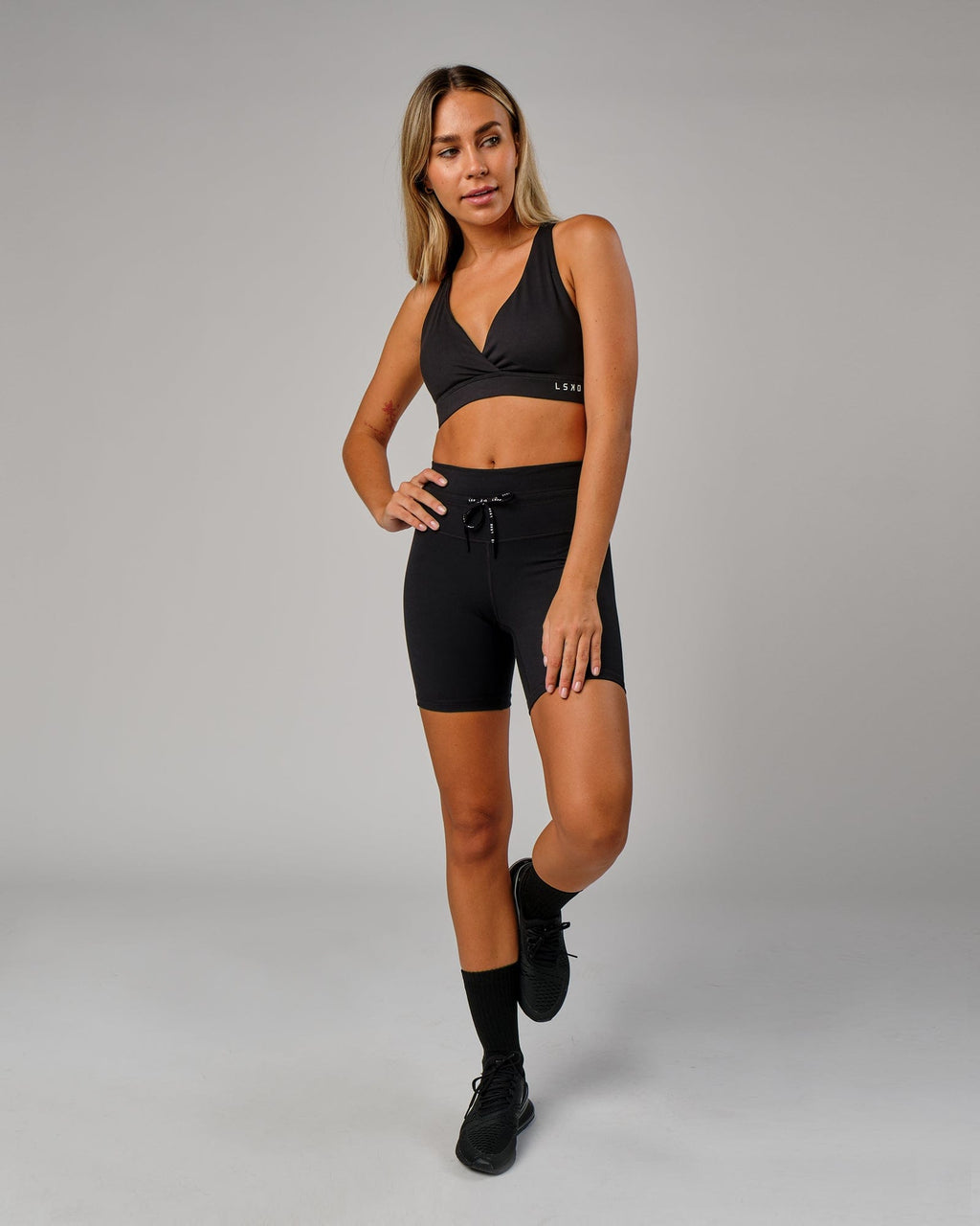 Model wearing Lace Up Mid Short Tight - Black