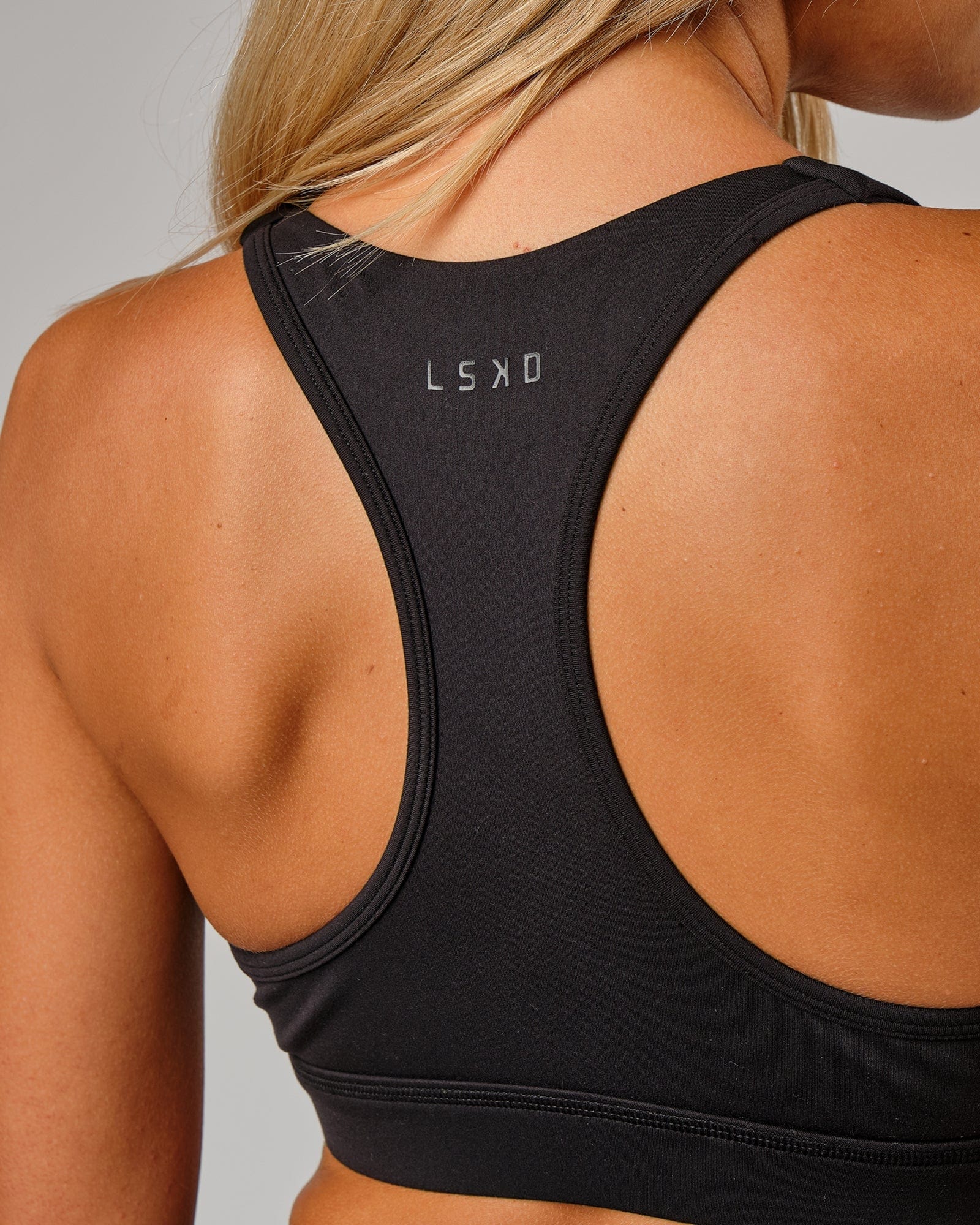 Model wearing Ignite Sports Bra - Black