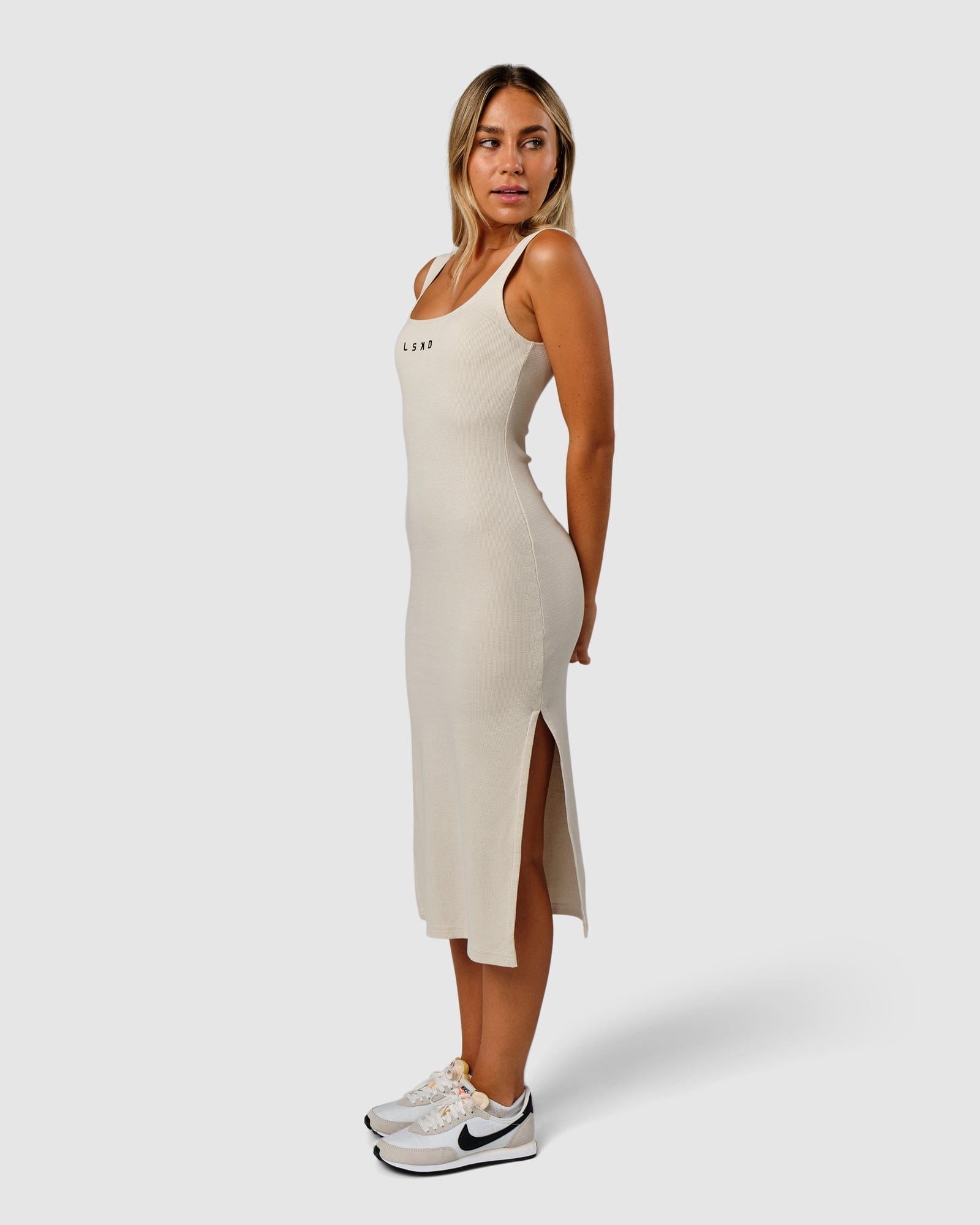 Model wearing Ava Ribbed Tank Dress - Bone