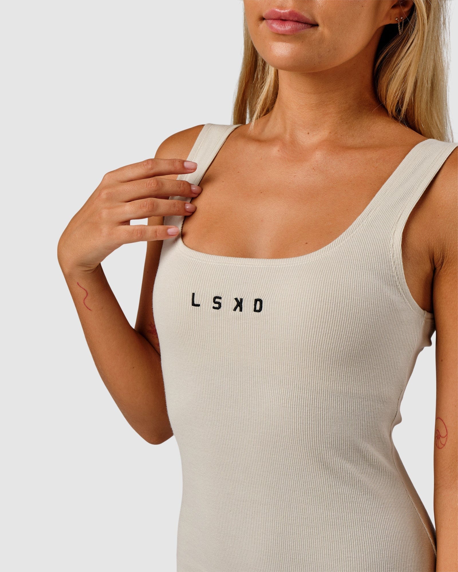 Model wearing Ava Ribbed Tank Dress - Bone