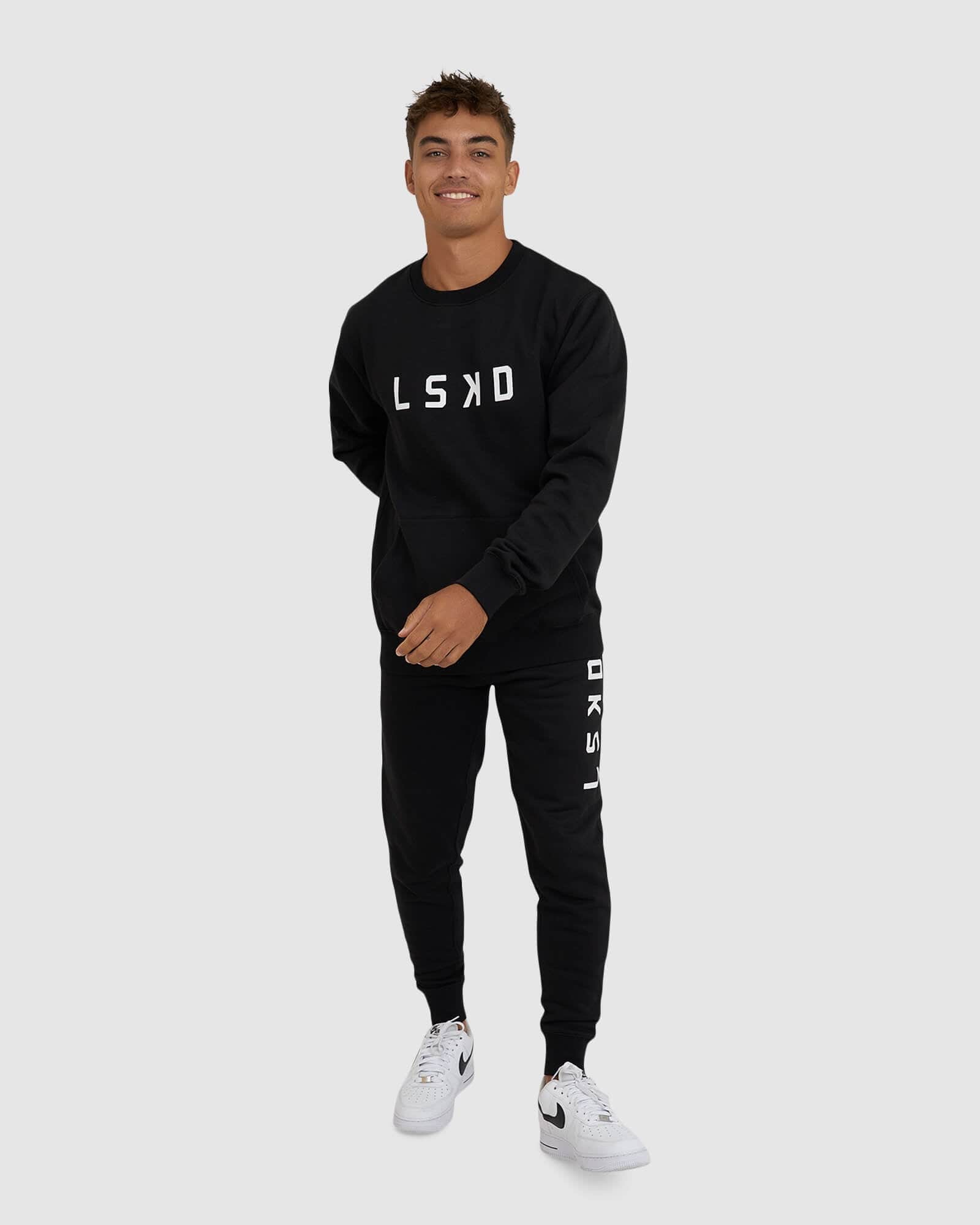 Model wearing Unisex Structure Sweater - Black-White