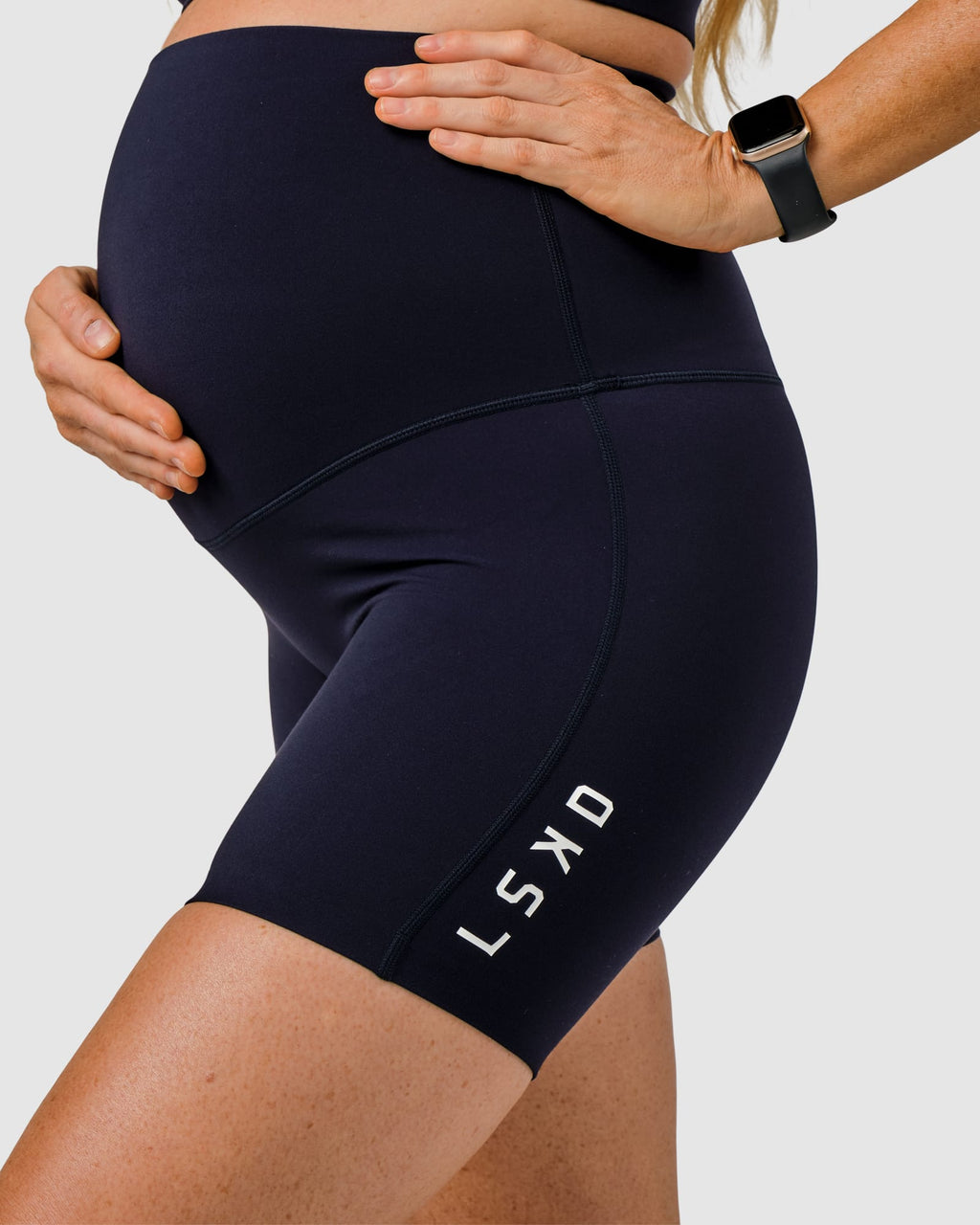 Model wearing Elixir Mid Short Maternity Tight - Navy