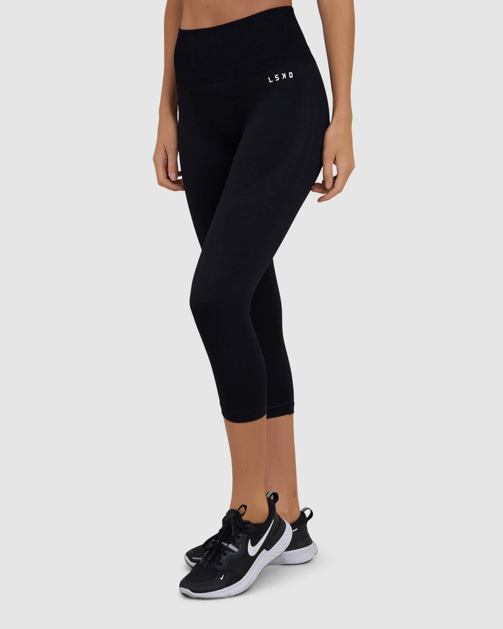 Model wearing Limitless Seamless 3/4 Length Tight - Black
