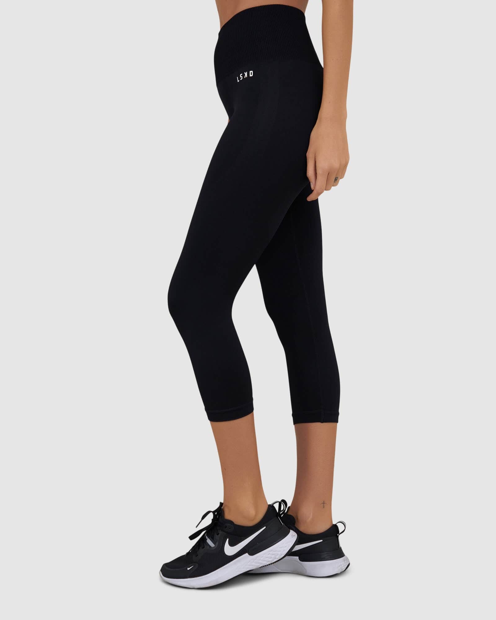 Model wearing Limitless Seamless 3/4 Length Tight - Black