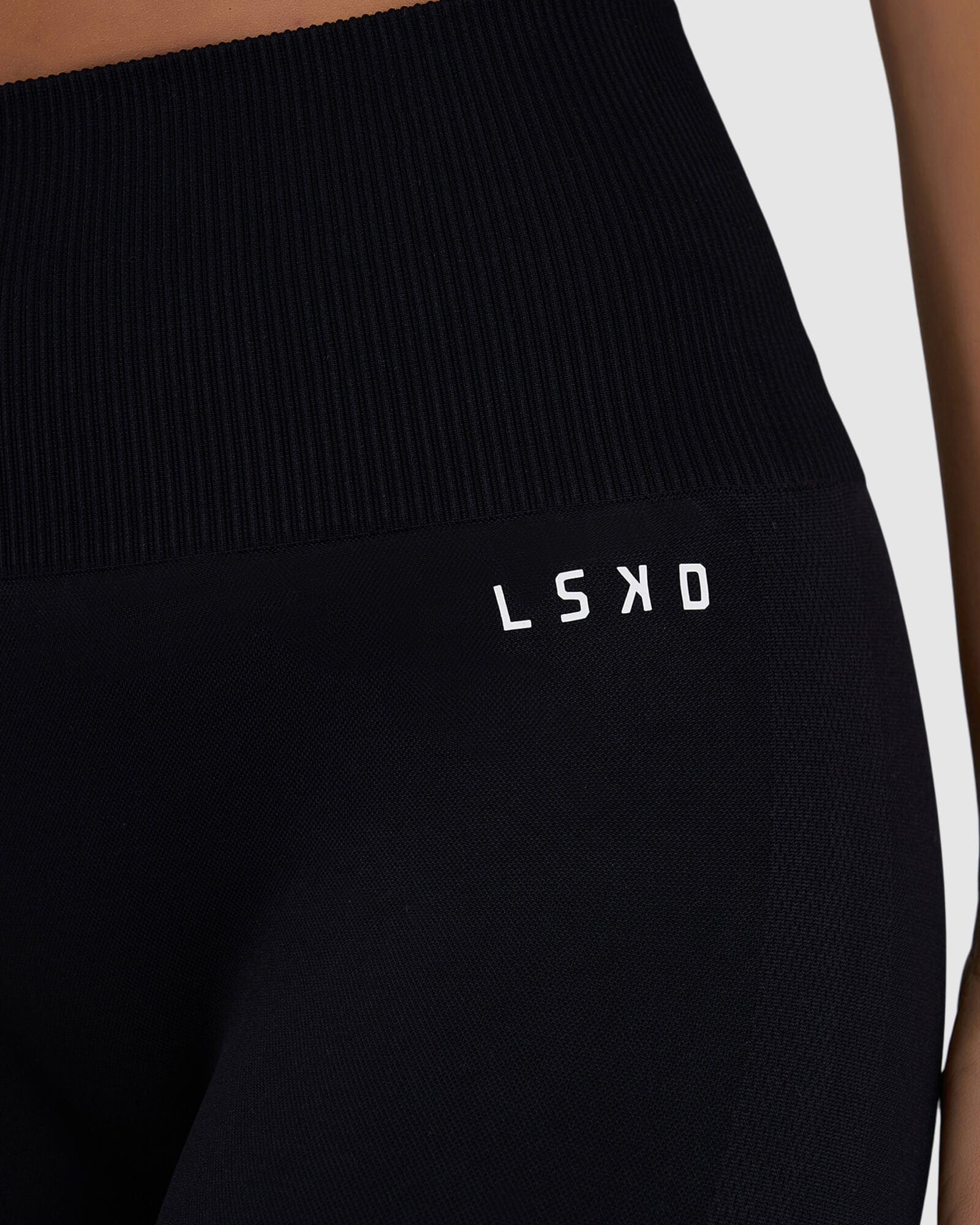 Model wearing Limitless Seamless 7/8 Length Tight - Black