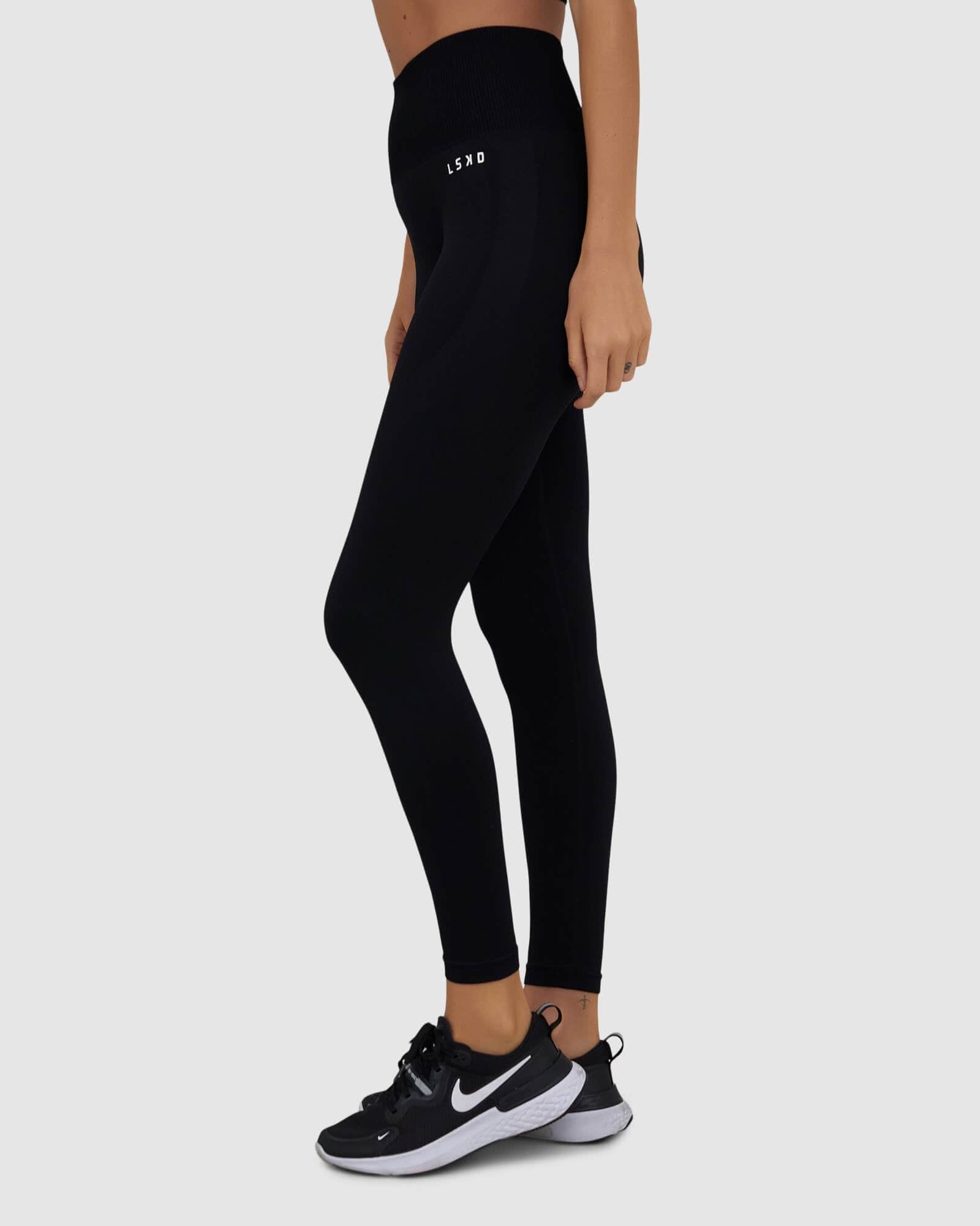 Model wearing Limitless Seamless 7/8 Length Tight - Black