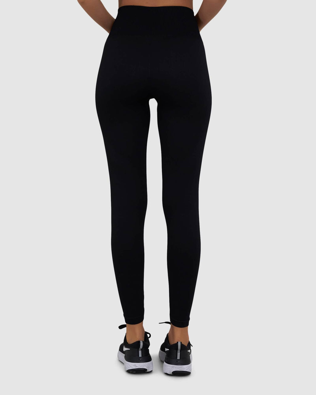 Model wearing Limitless Seamless 7/8 Length Tight - Black