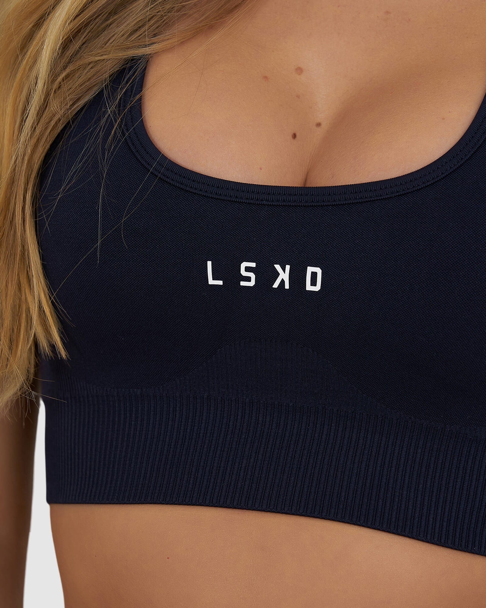 Model wearing Limitless Seamless Sports Bra - Navy