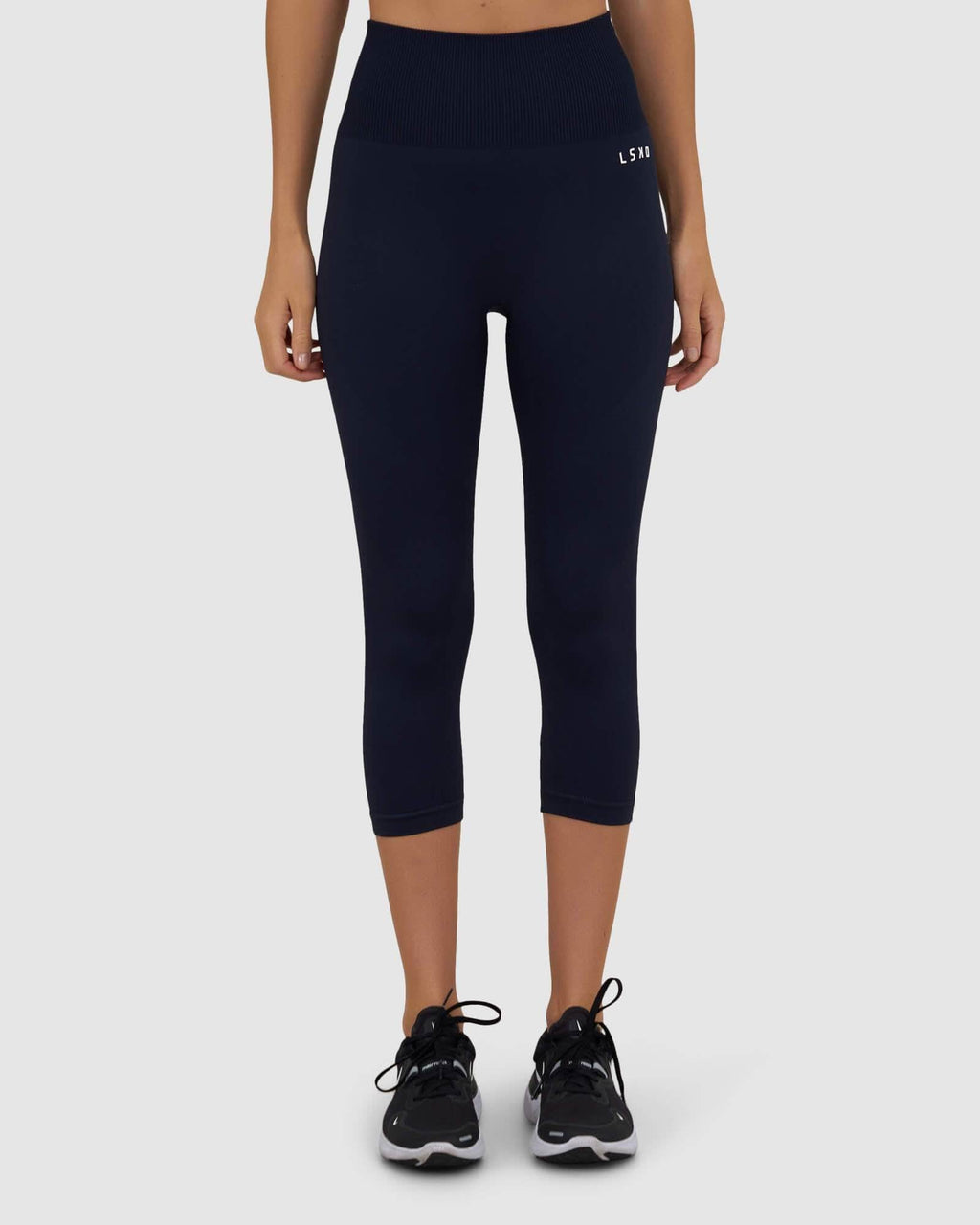 Model wearing Limitless Seamless 3/4 Length Tight - Navy