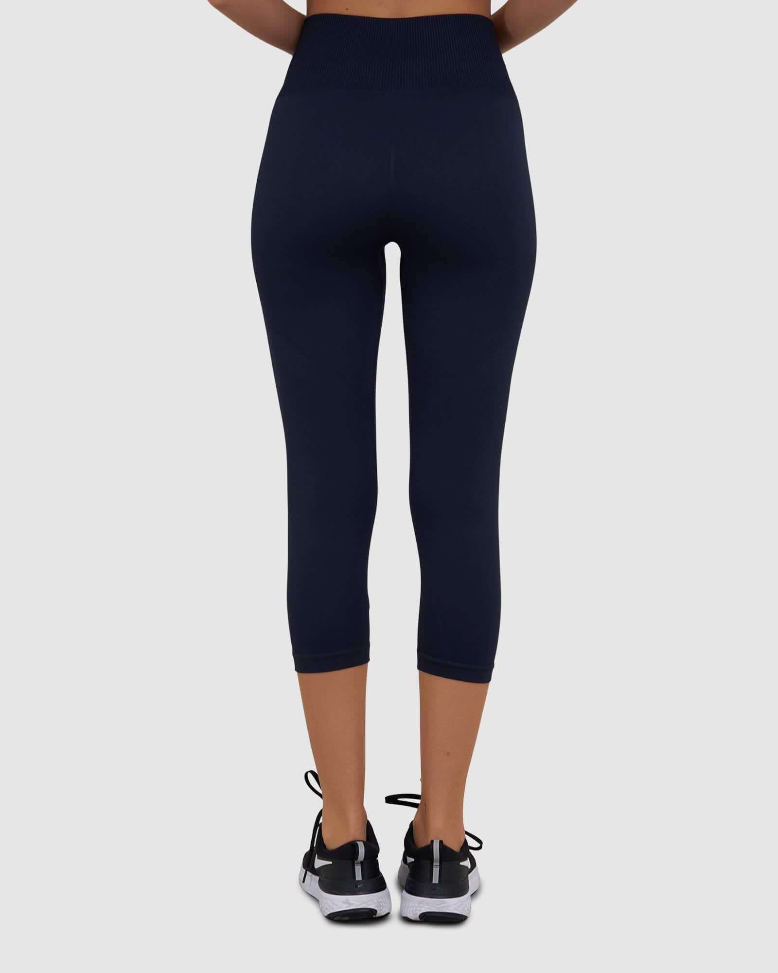 Model wearing Limitless Seamless 3/4 Length Tight - Navy