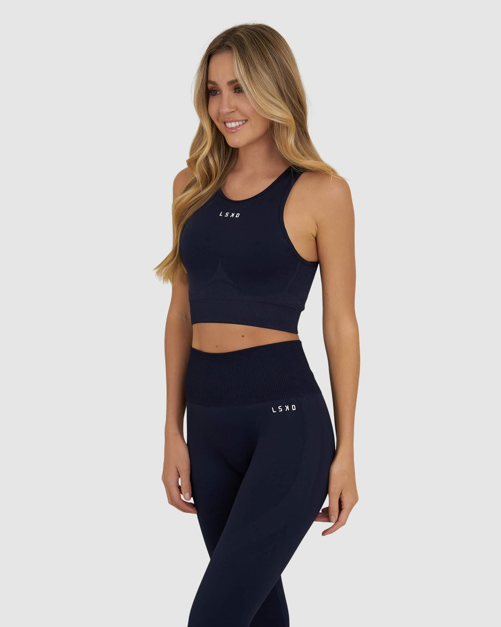 Model wearing Limitless Seamless Crop Top - Navy