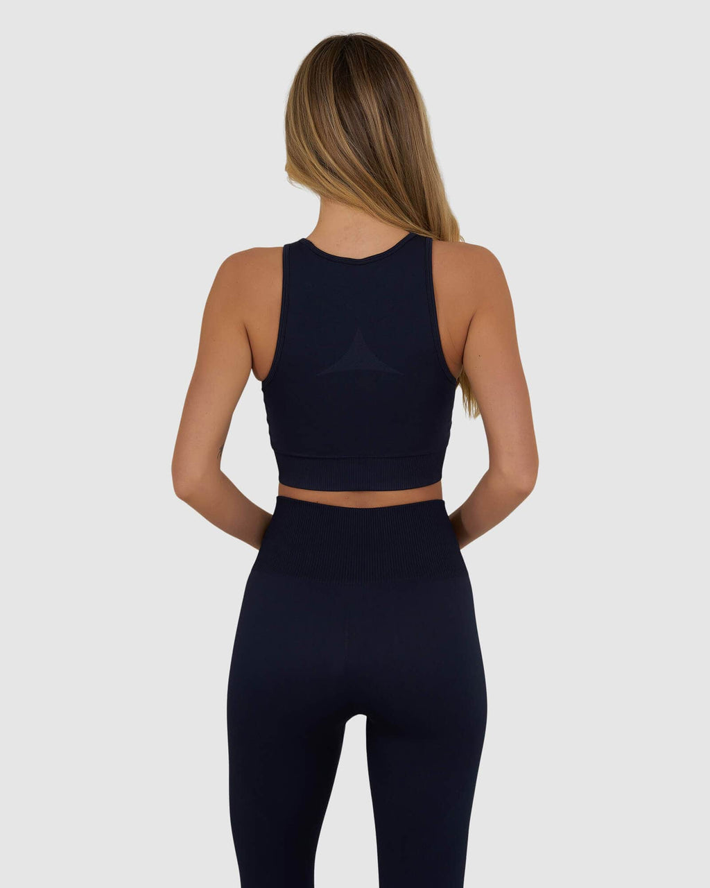 Model wearing Limitless Seamless Crop Top - Navy