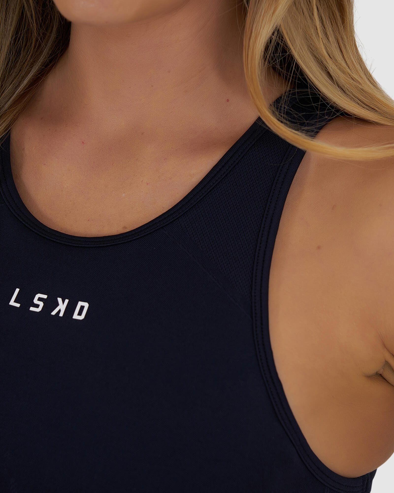 Model wearing Limitless Seamless Crop Top - Navy