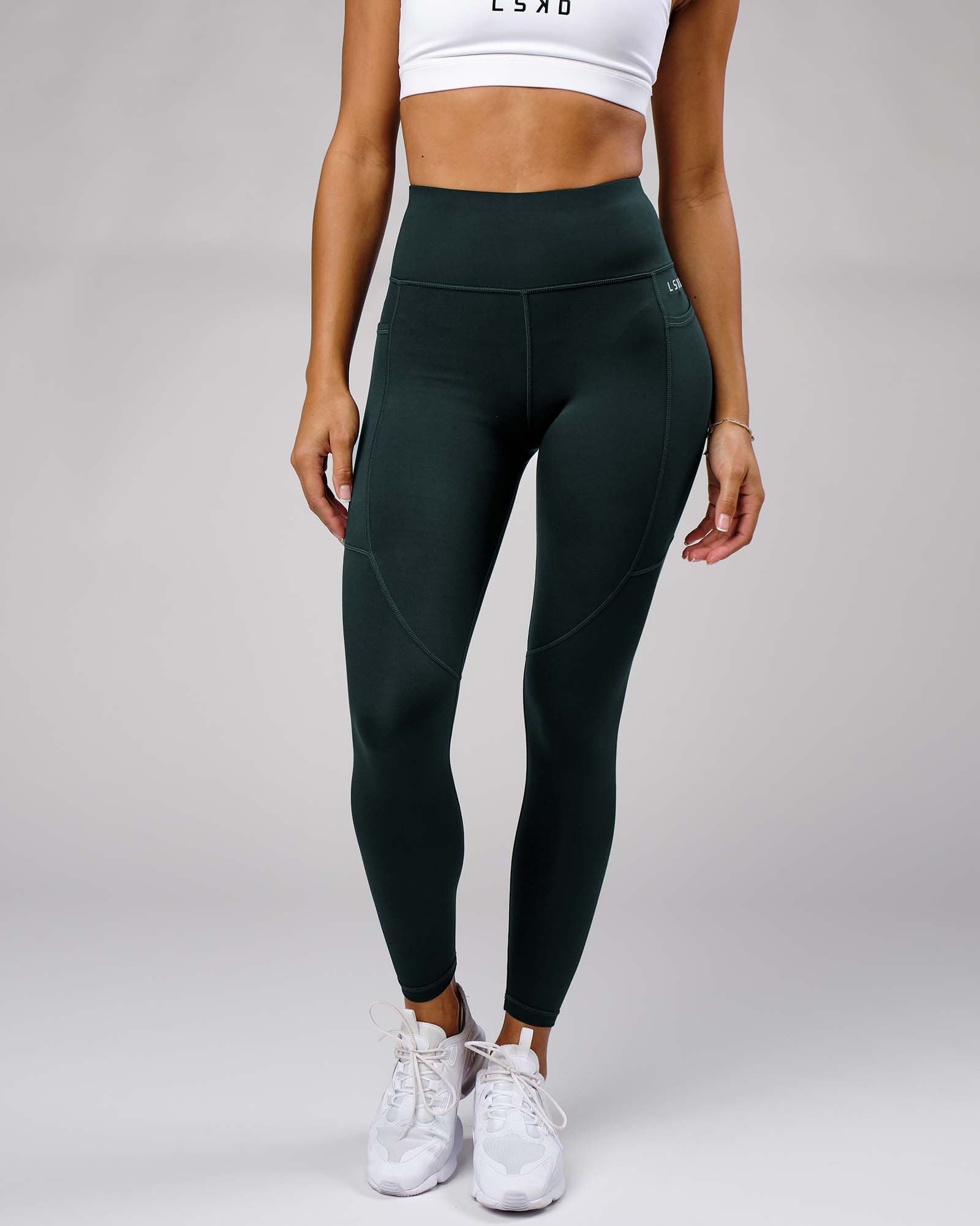 Model wearing Rep Full Length Tight Small Logo - Deep Teal