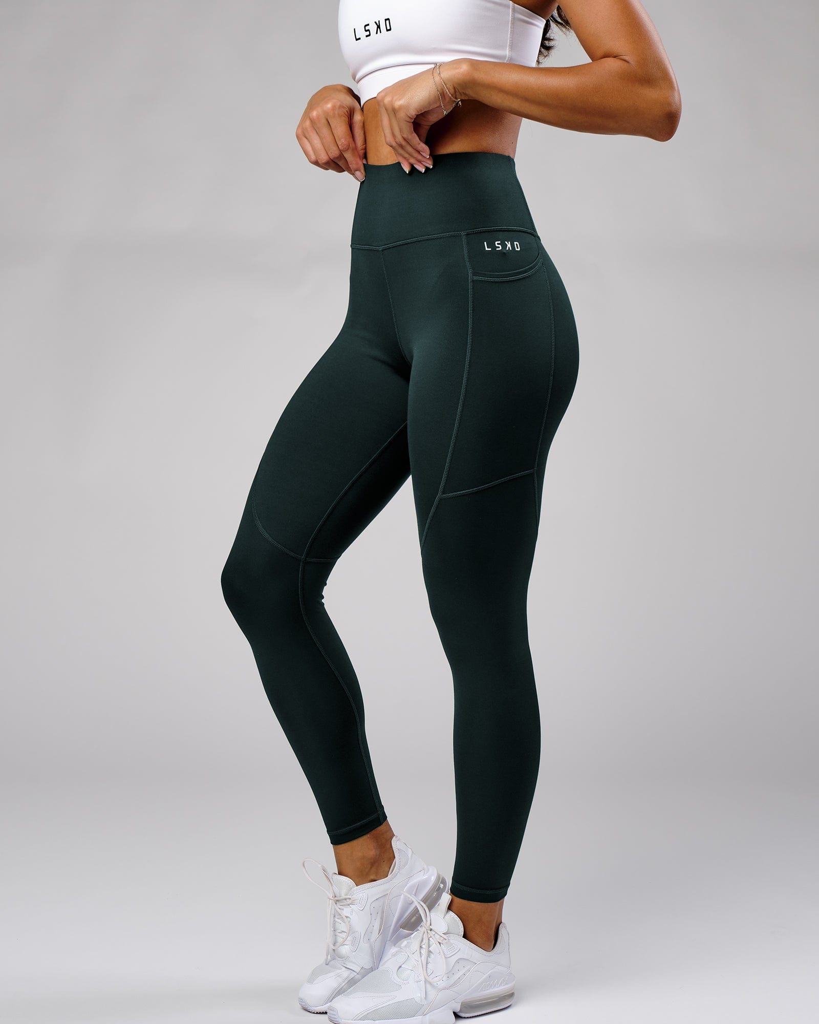Model wearing Rep Full Length Tight Small Logo - Deep Teal