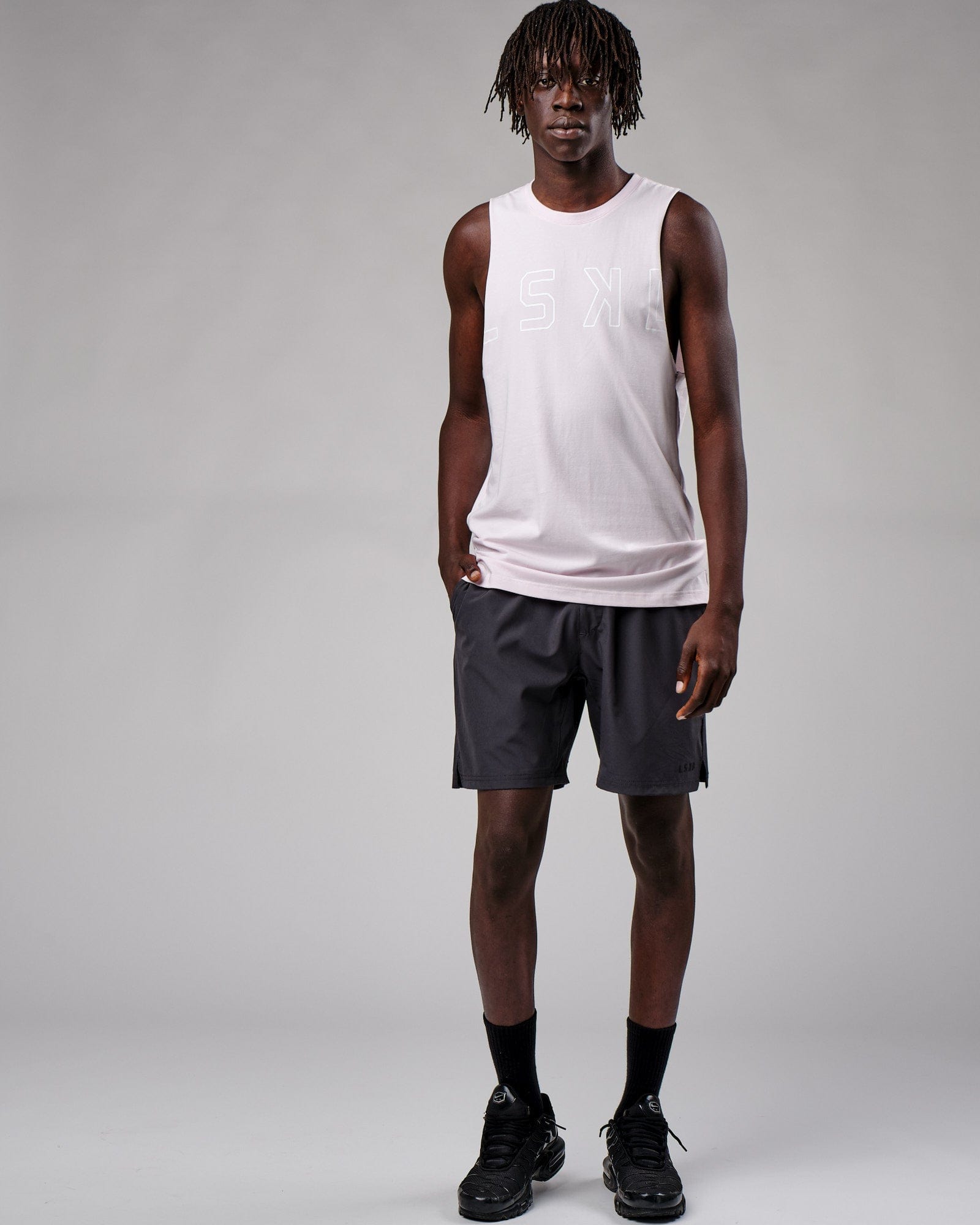 Model wearing Expand FLXCotton Training Fit Tank - Orchid Ice