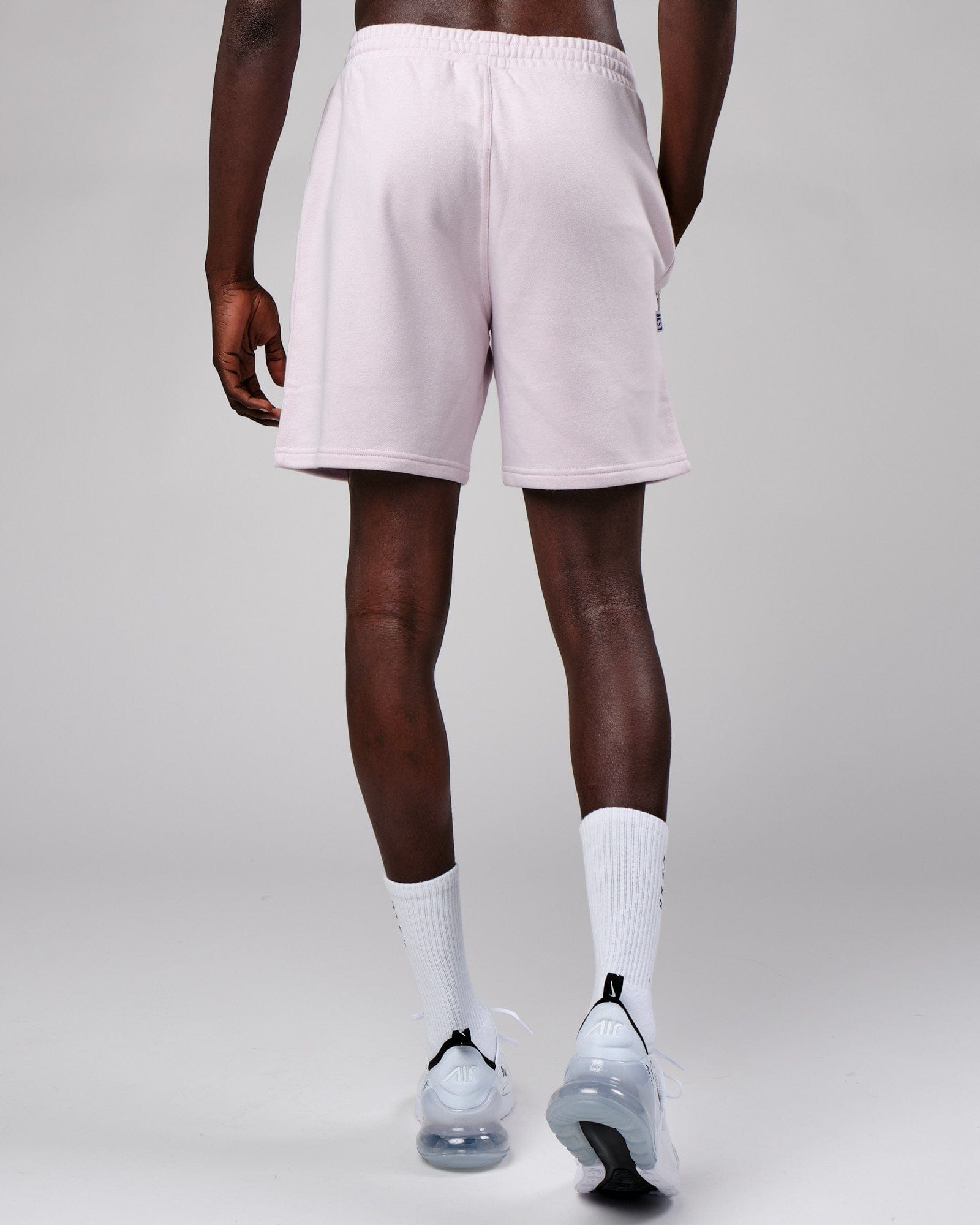 Model wearing Connor Track Short - Orchid Ice