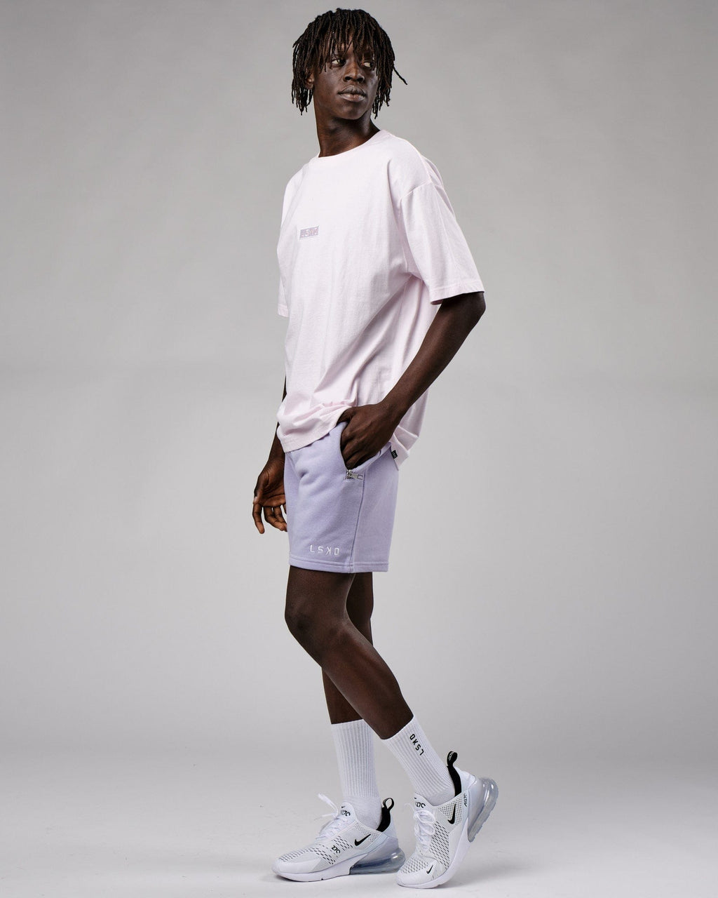 Model wearing Connor Track Short - Cosmic Sky