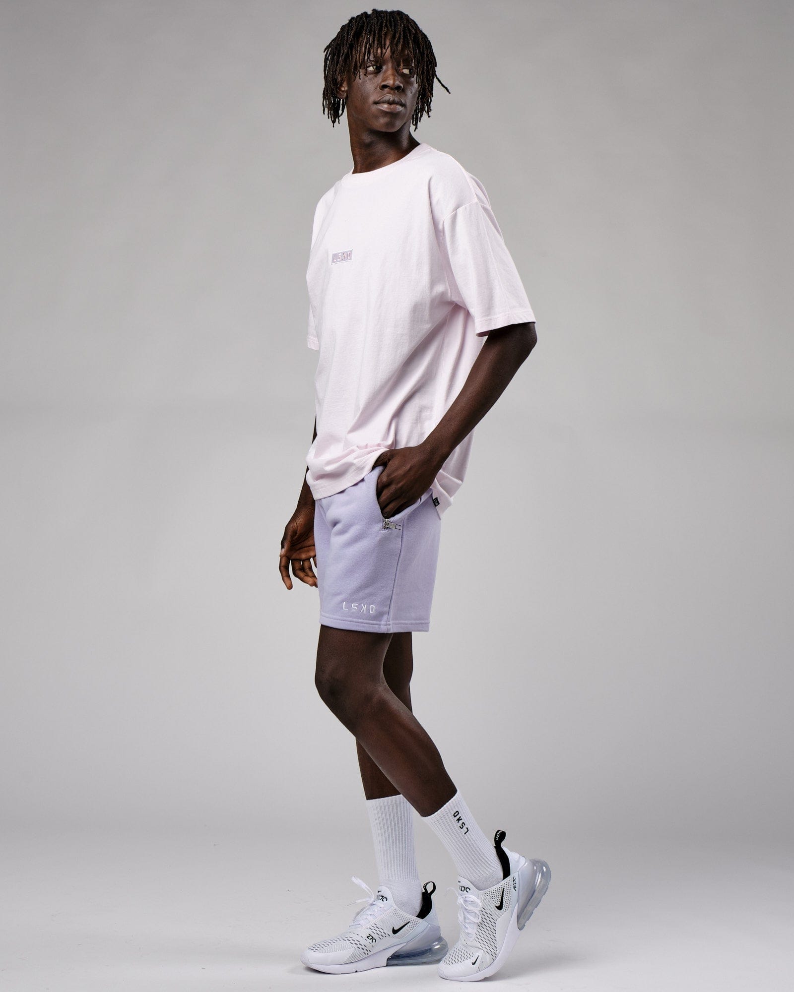 Model wearing Connor Track Short - Cosmic Sky