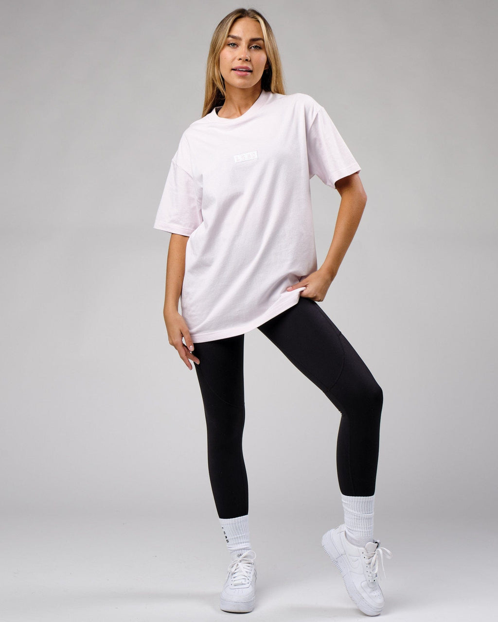 Model wearing Unisex Cornerstone Tee Oversize - Orchid Ice