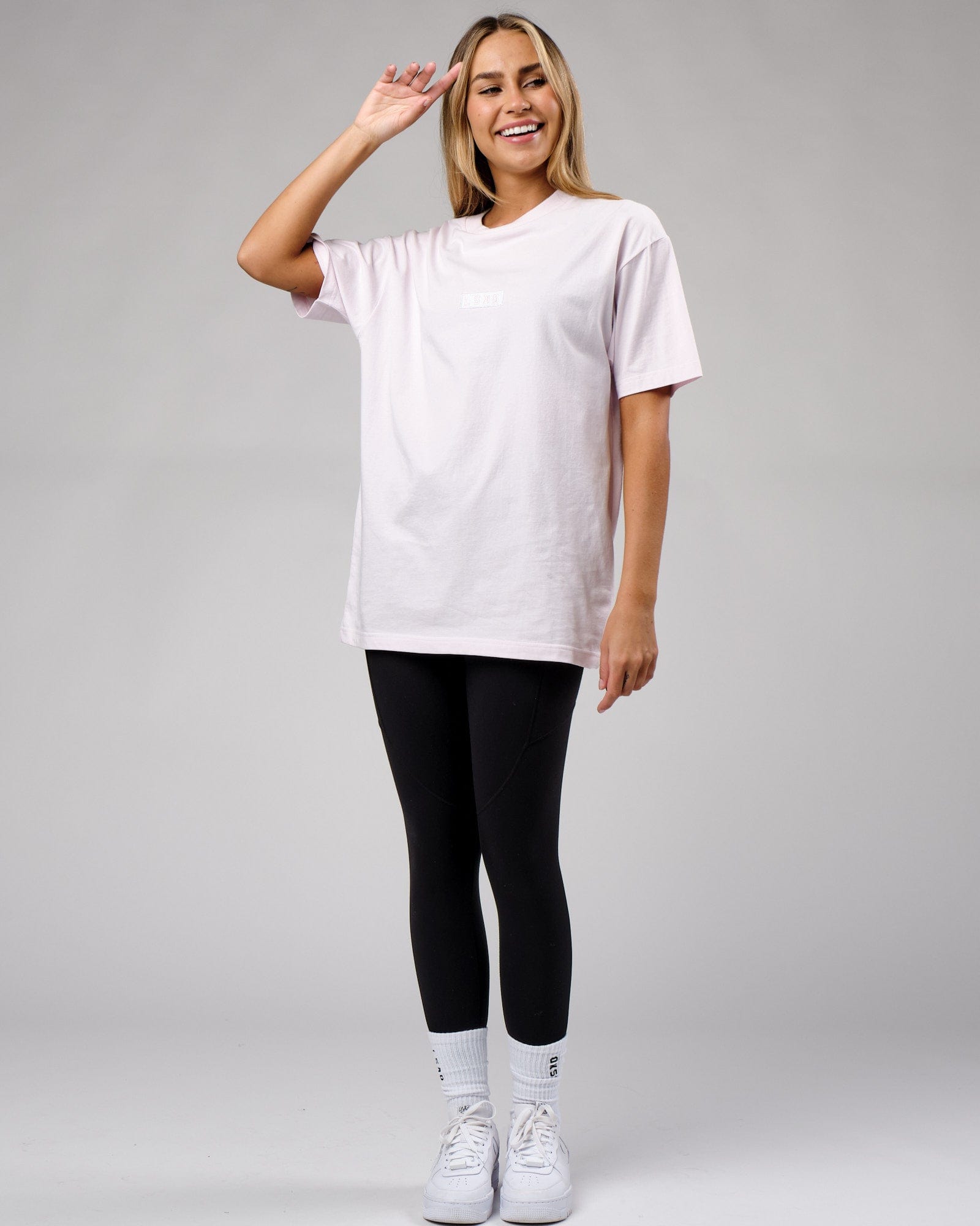 Model wearing Unisex Cornerstone Tee Oversize - Orchid Ice