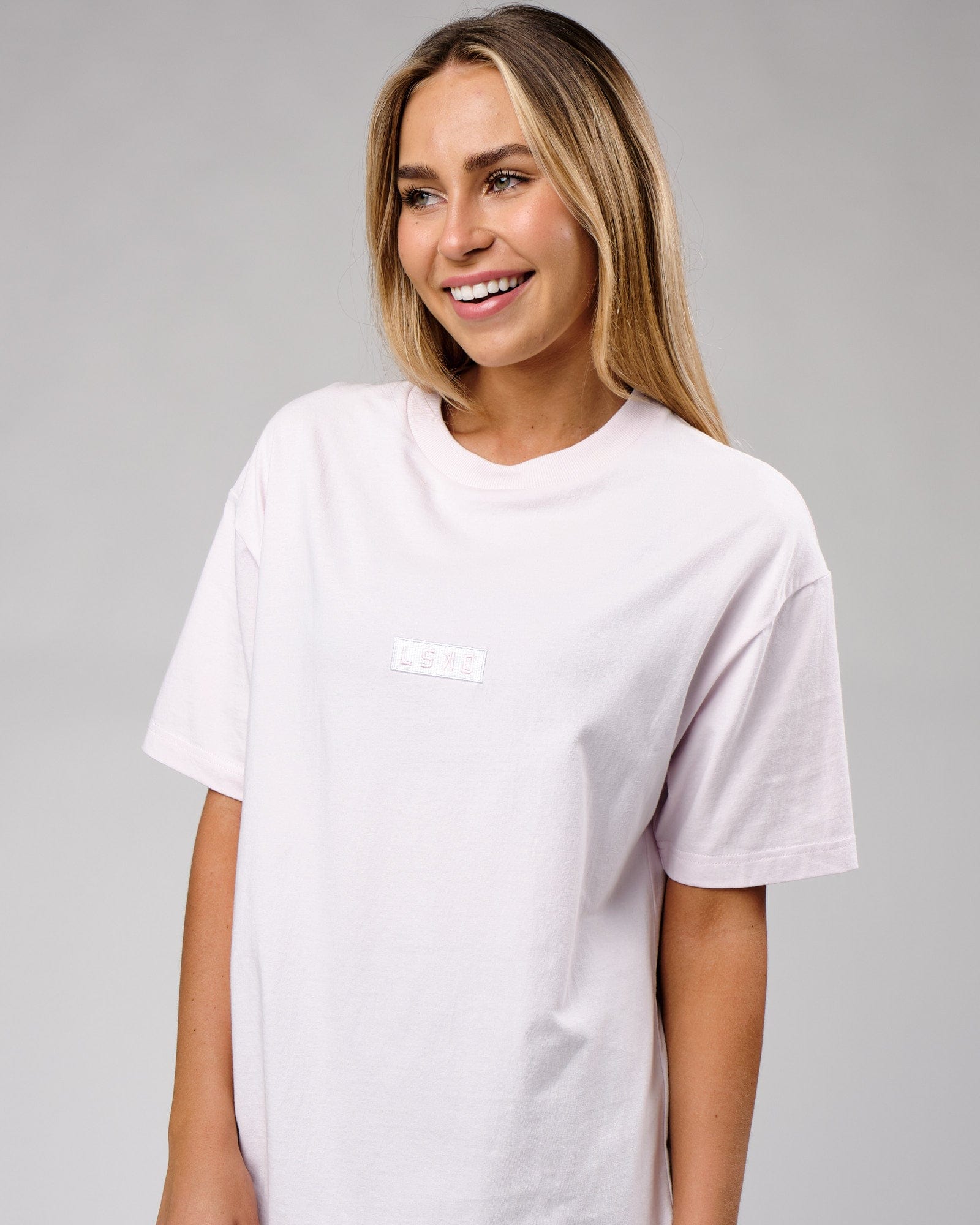 Model wearing Unisex Cornerstone Tee Oversize - Orchid Ice