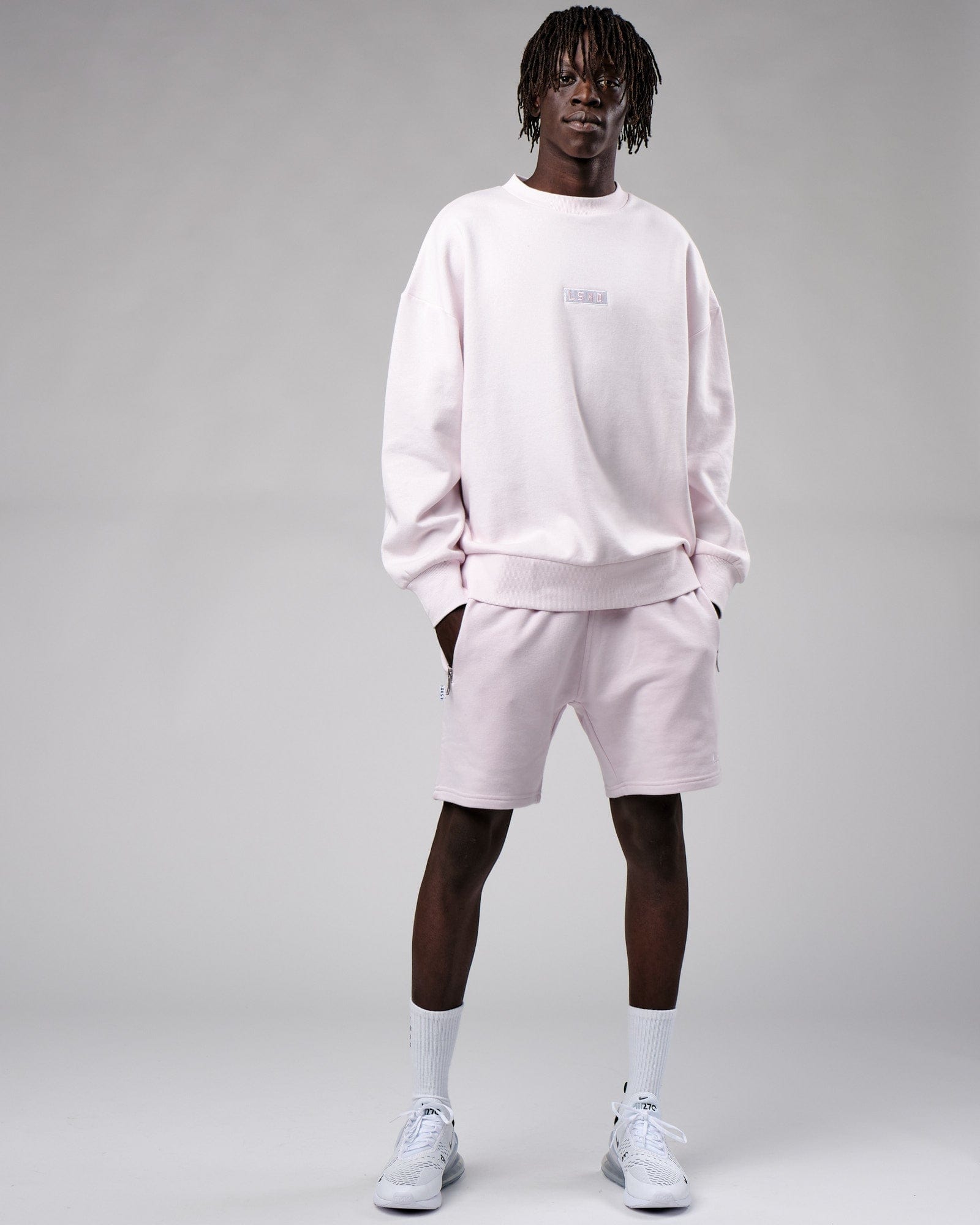 Model wearing Connor Track Short - Orchid Ice