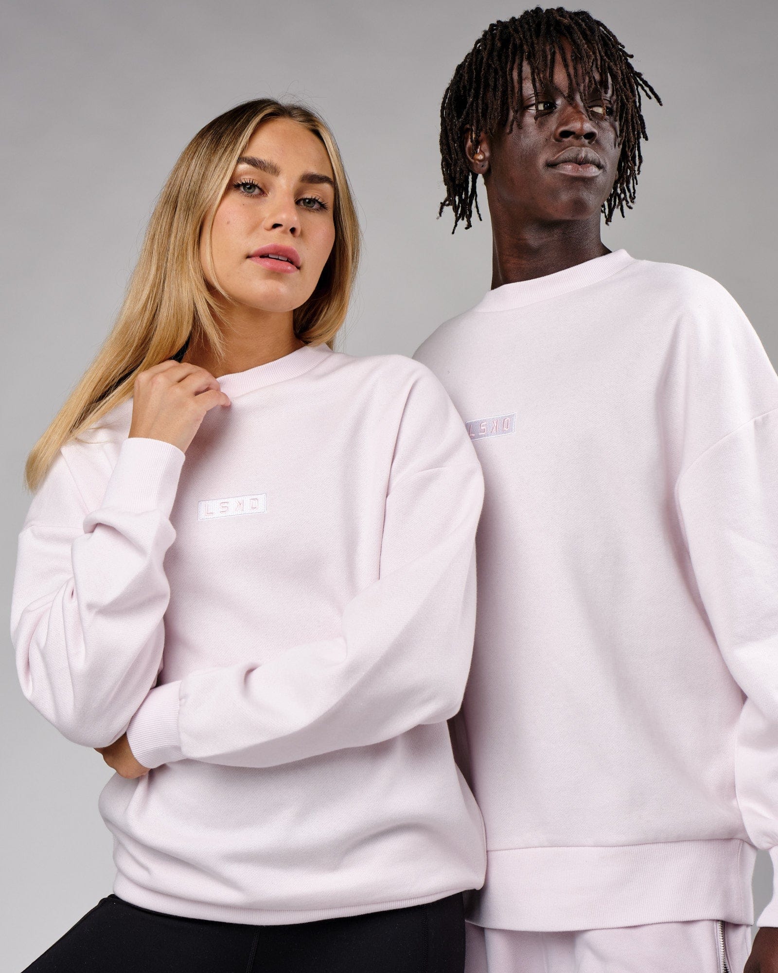 Model wearing Unisex Cornerstone Sweater Oversize - Orchid Ice