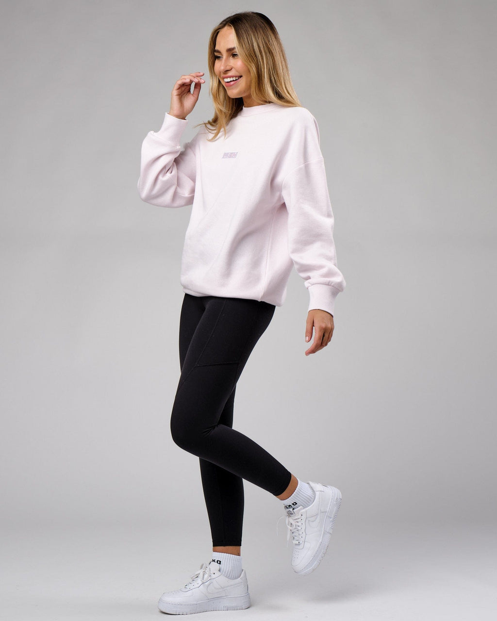 Model wearing Unisex Cornerstone Sweater Oversize - Orchid Ice