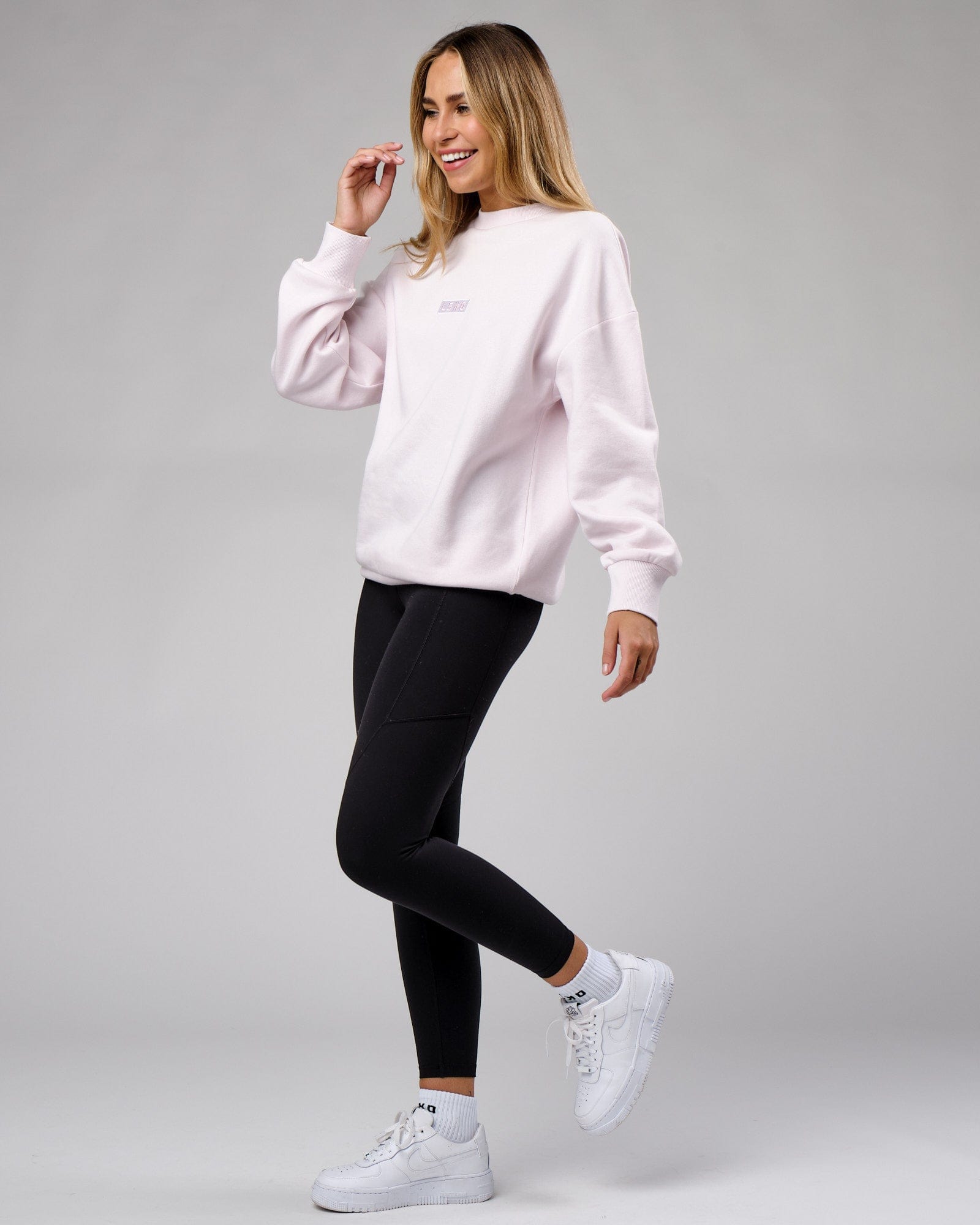 Model wearing Unisex Cornerstone Sweater Oversize - Orchid Ice