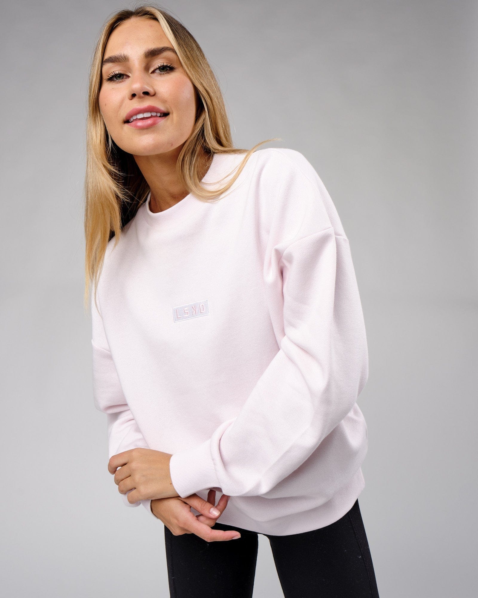 Model wearing Unisex Cornerstone Sweater Oversize - Orchid Ice