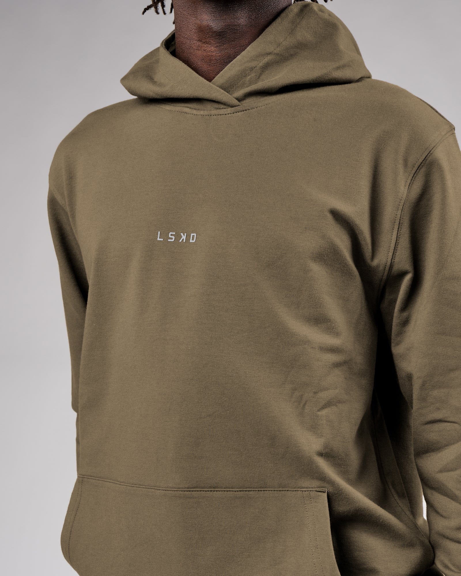 Model wearing Base Hoodie - Walnut Grey