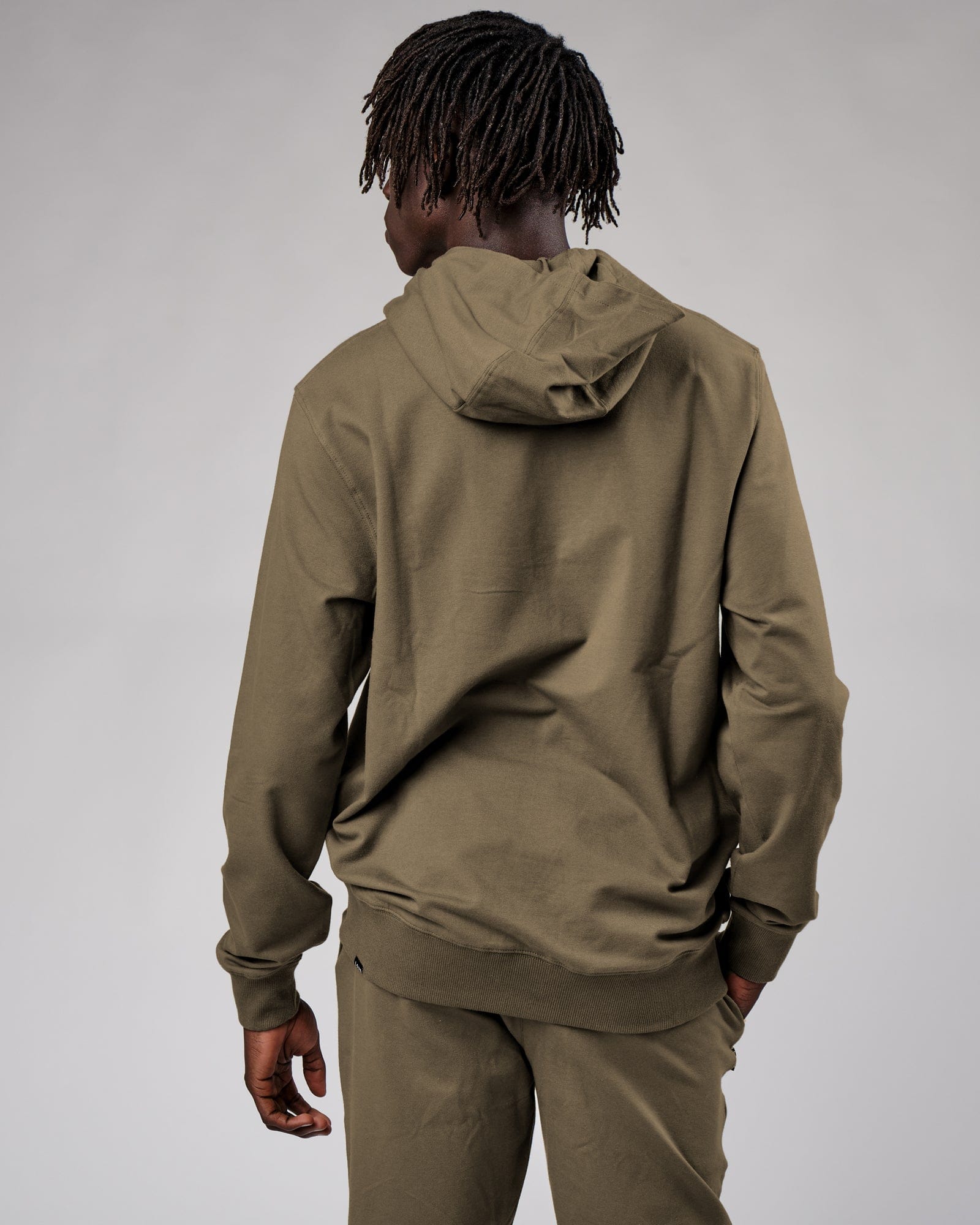 Model wearing Base Hoodie - Walnut Grey