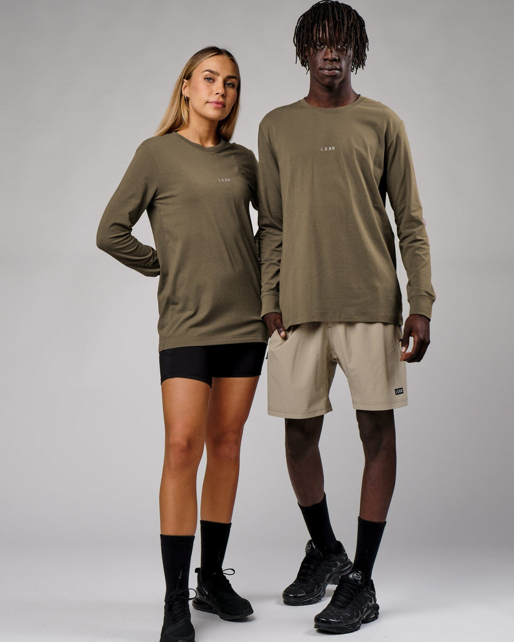 Model wearing Unisex Base LS Tee - Walnut Grey