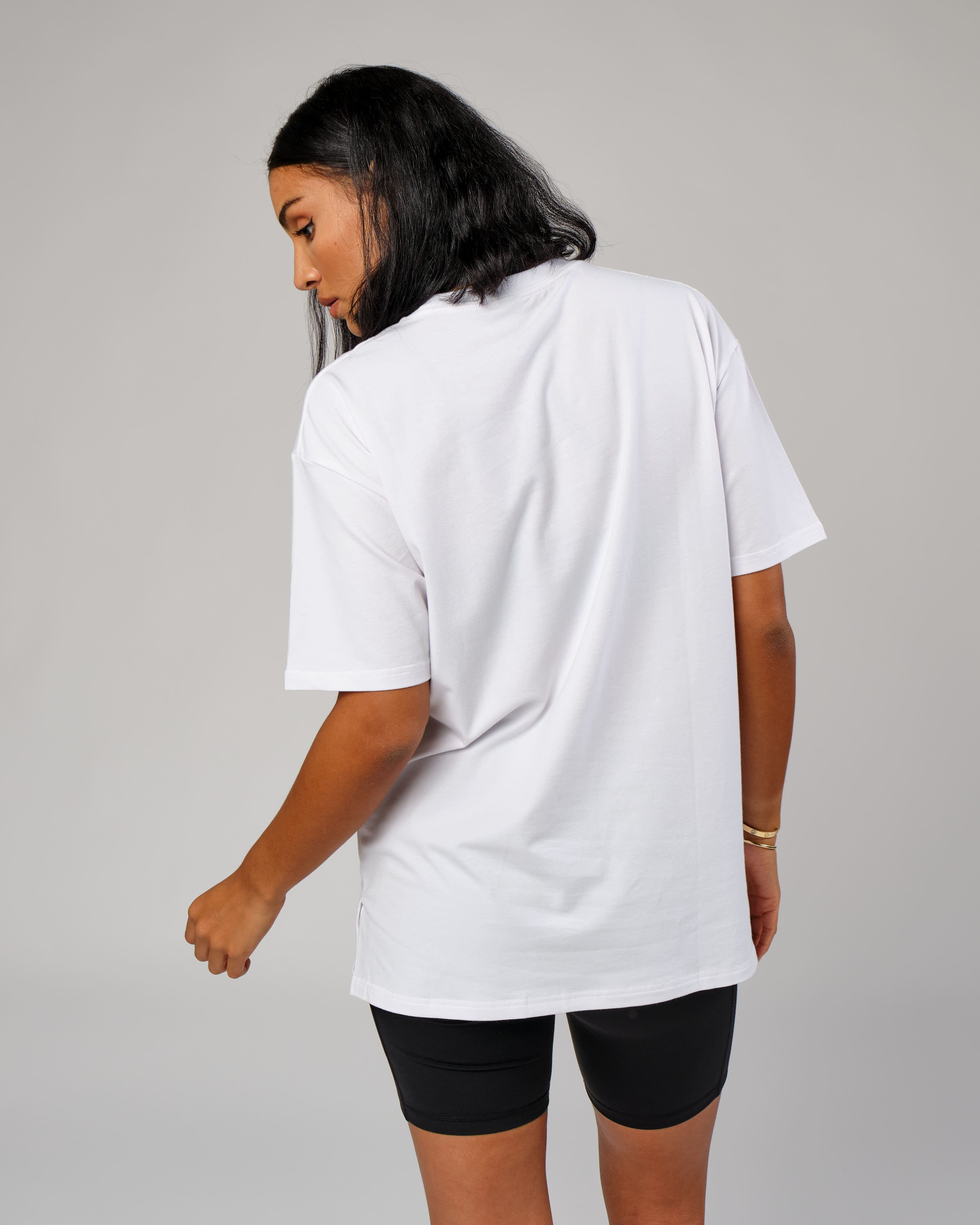 Model wearing Unisex Easy Tee Oversize - White