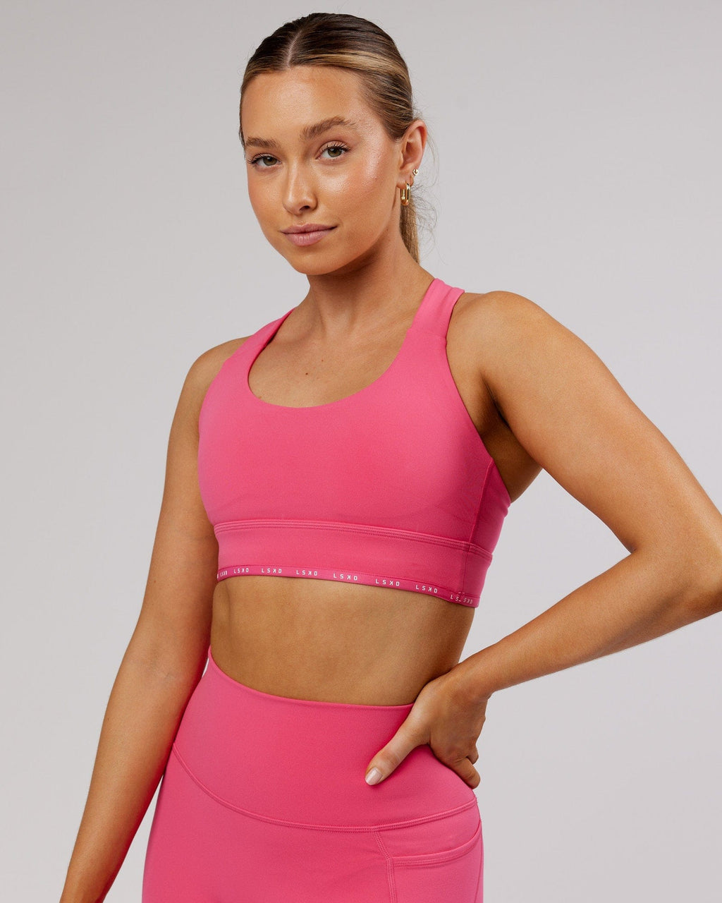 Model wearing MVP Sports Bra - Flamingo