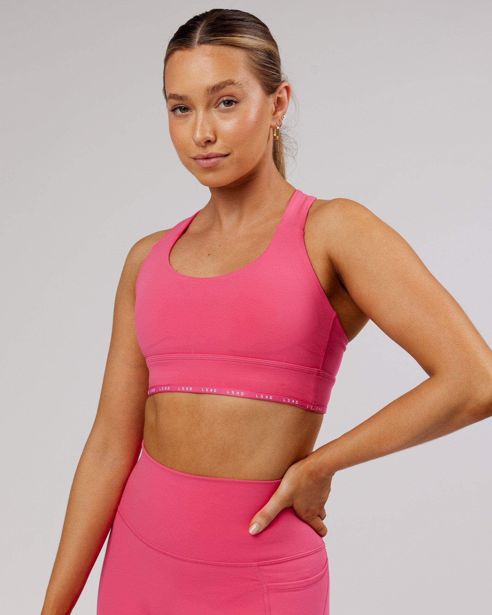 Model wearing MVP Sports Bra - Flamingo