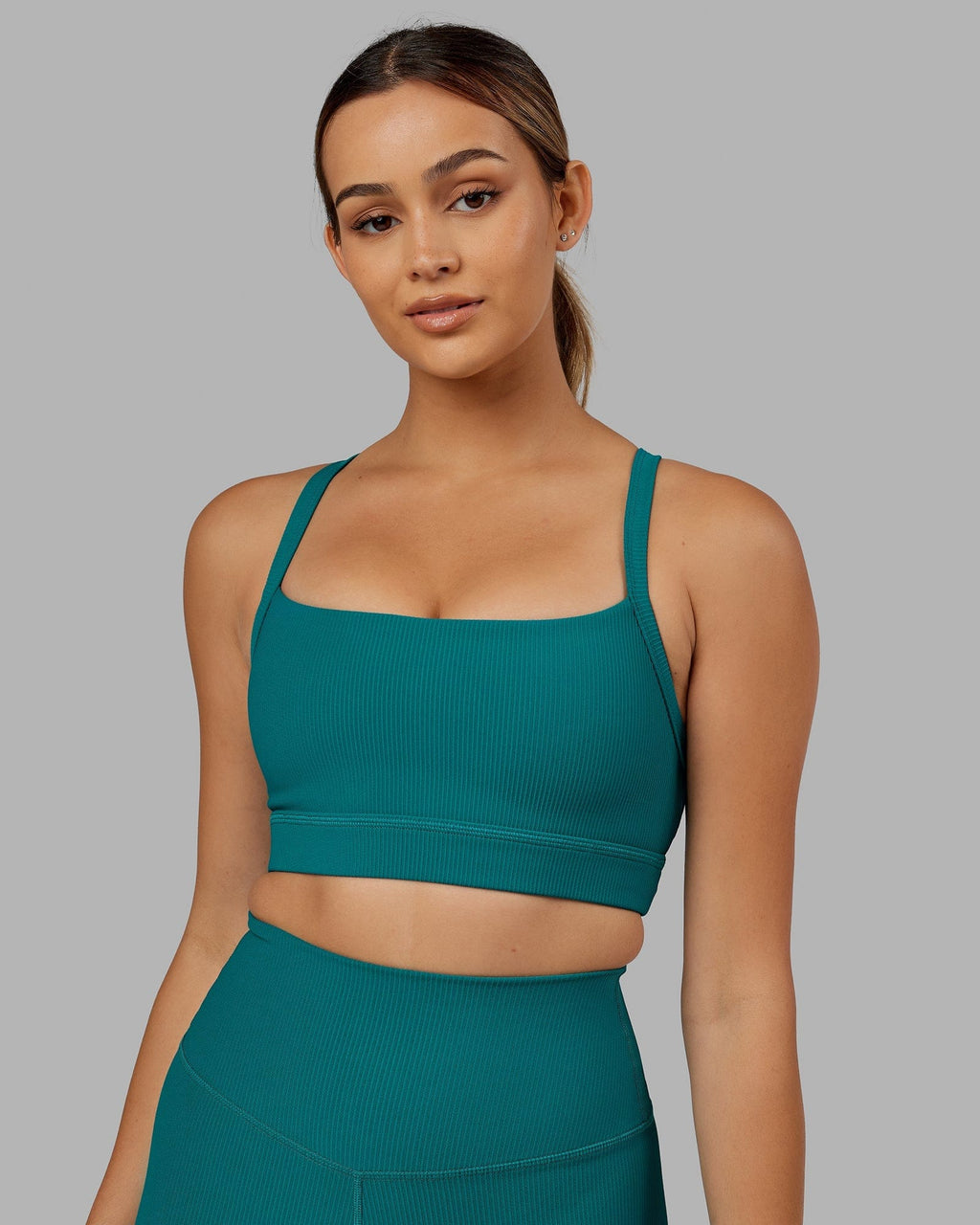 Model wearing Momentum Ribbed Sports Bra - Sea Green