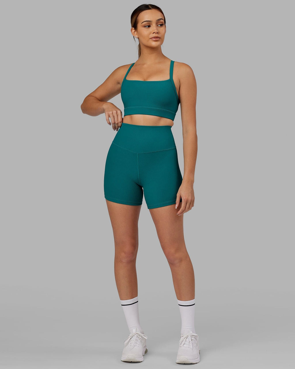 Model wearing Momentum Ribbed Sports Bra - Sea Green